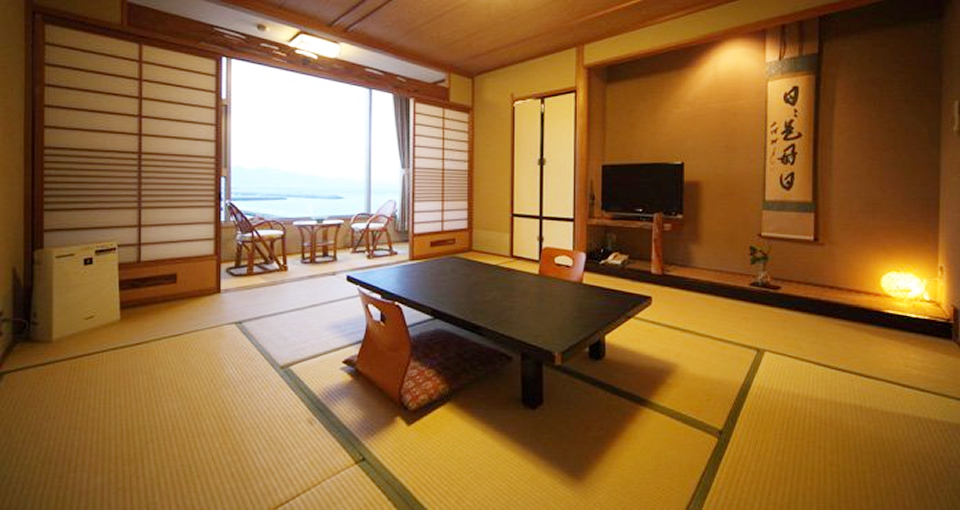 Japanese-Western style room with scenic cypress bath